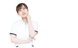 頬に手を当てて考える歯科スタッフ